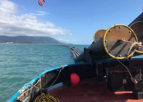 North Marine tugboat transports cargo on the Great Barrier Reef for dredging company Hall Contracting, from the Port of Cairns to central QLD